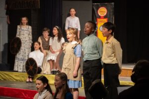 Pupils singing during chitty chitty bang bang